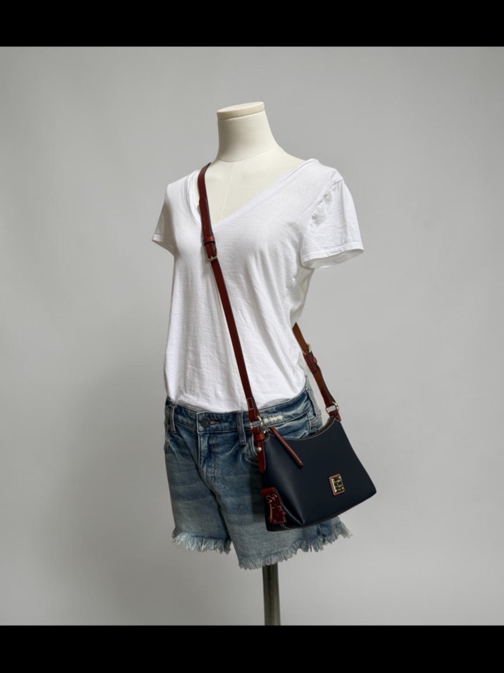 Dooney & Bourke Penrose Navy Leather Crossbody with Brown Trim and Gold Hardware - Picture 14 of 15